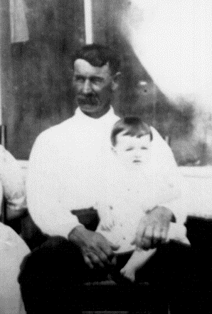Will Block, Sr. holding W. T. Block, Jr. in 1921